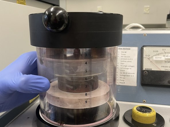 Place the grids with the carbon side facing upwards on a glass slide.