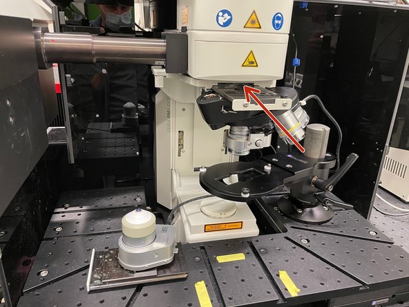 Slide out the 25x objective.