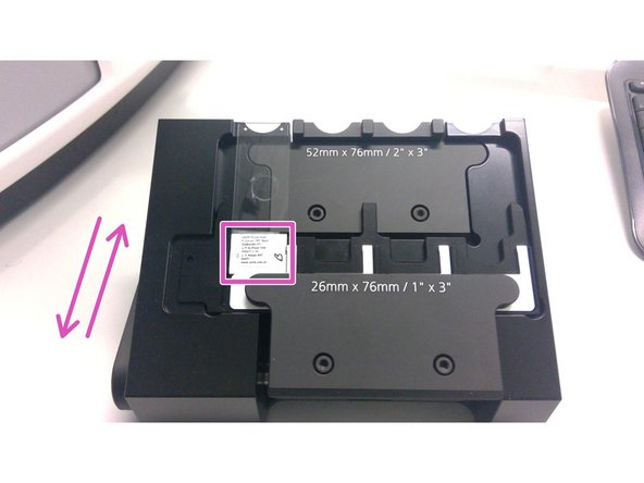 Load/unaload your sample:  Make sure that all trays are unloaded and take out your slides