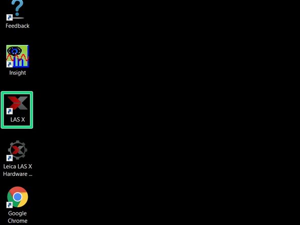 To lower the stage open and lower the holding ring.