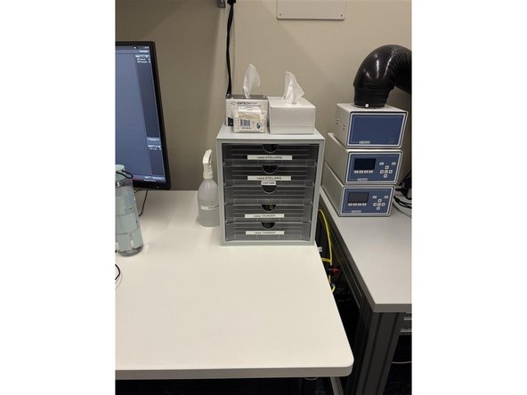 Find a live-cell chamber in the tower next to the microscope.