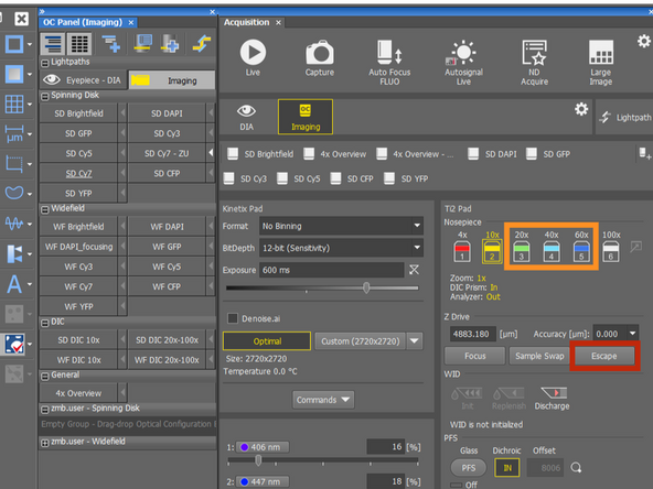 Click on the Escape, this will lower objective to the load position. You can check that the Z-drive value should decrease to 499/500.