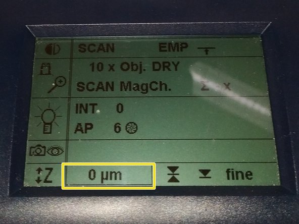 Jointly press the &quot;SET&quot; and upper &quot; Z&quot; button (right side of the microscope stand) to set the current   z-position to zero.