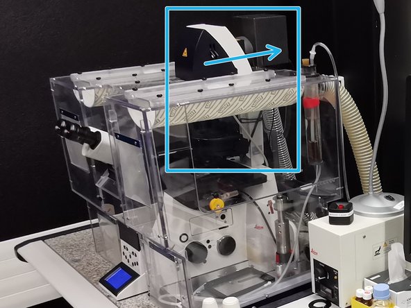 Push the  condenser arm of the microscope to the back.
