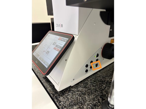 Lower the stage and remove your sample.