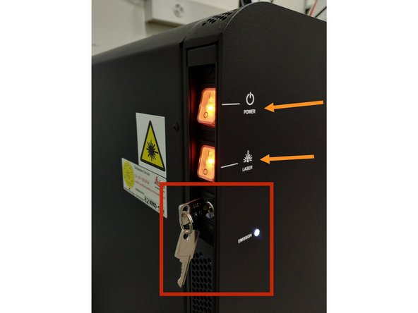 Turn off the Laser unit (control unit next to the microscope) and switch OFF the &quot;Laser&quot; and &quot;Power &quot; switches.