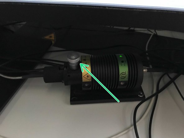 Before regulating the laser intensity, go Live in the LAS X software. Turn the dial to open (clockwise) and close (counterclockwise) the beam attenuator slit in order to regulate the laser power. For optimal laser intensity adjustment, please also refer to Step 10 in our image acquisition guide.