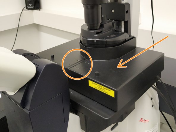 This cover has to be opened for accessing the sample.