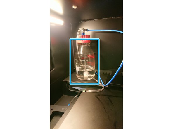 Open the incubator box on the microscope.