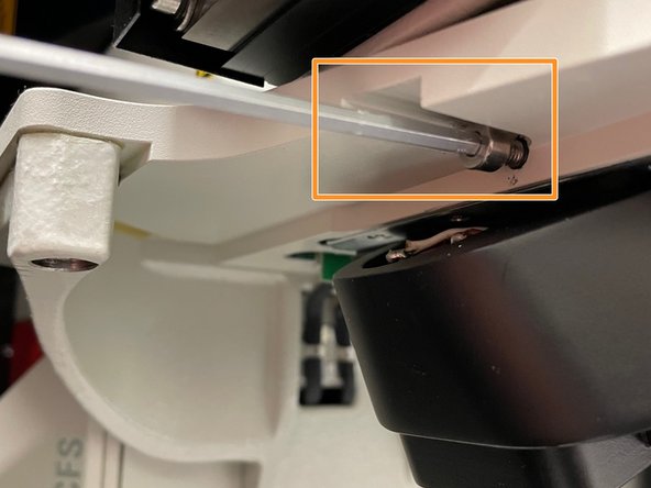 Loosen the screw. This only takes 2-3 turns. Be sure to not completely remove the screw.