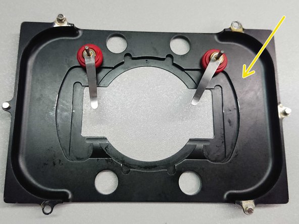Stage inserts can be easily exchanged or adapted for other samples than regular slides.  You can find additional inserts and adapters in the box on the table behind the microscope.