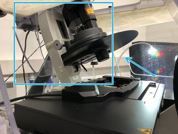 Push back the condenser arm.