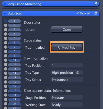 Make  sure that all trays are unloaded and take out your slides