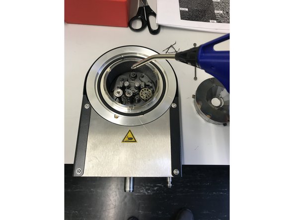 Take the compressed air tube and blow out the case.