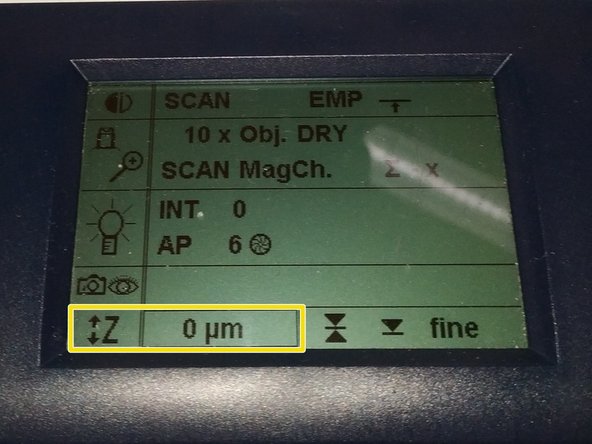 Jointly press the &quot;SET&quot; and upper &quot; Z&quot; button (right side of the microscope stand)  in order to set the current   z-positon to zero.