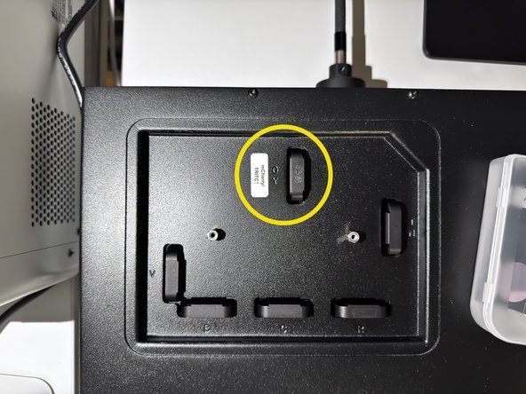 Open top cover on SPECTRA X light source.