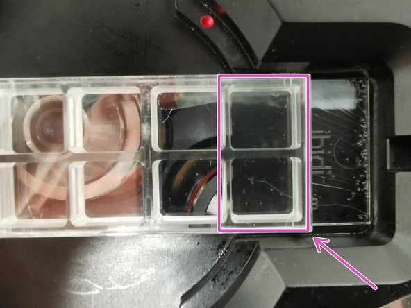 The slide chamber is hold in place by a spring loaded tab.