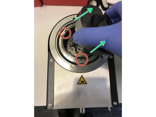 Put the carbon head in front of you and take the metal protection off.