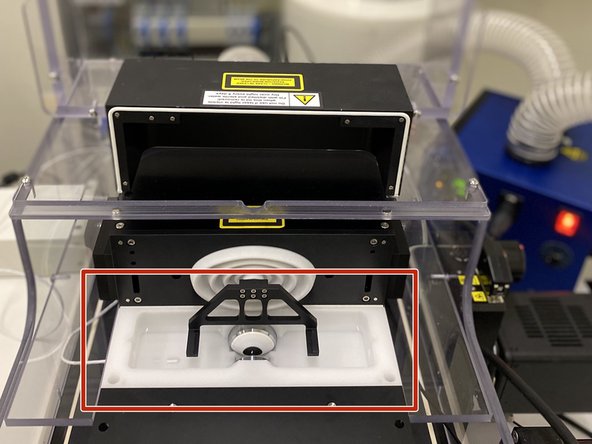 Fill the imaging chamber with MilliQ water until both detection objectives are submerged.
