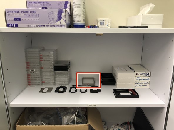 It should be located in the cabinet close to the door.