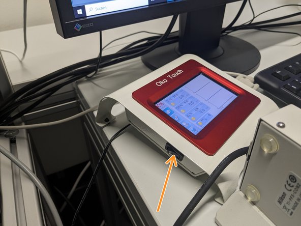 Switch on the &quot;Oko Touch&quot; (located at the PC table).