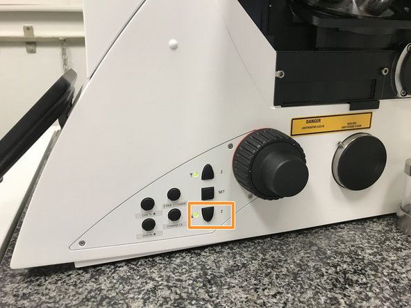 Lower the objective and remove your sample.