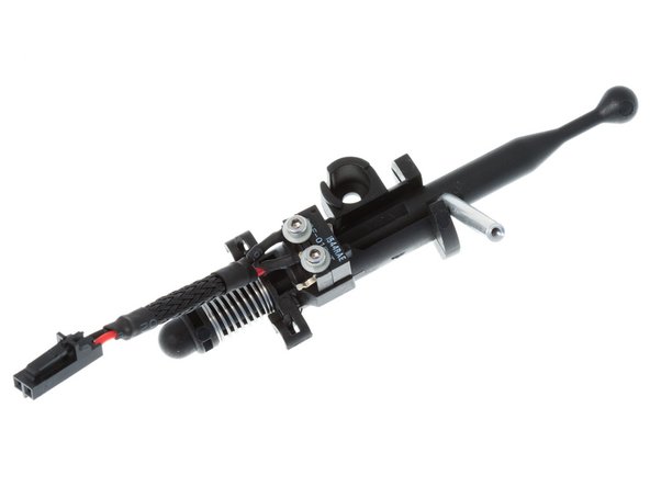 Insert M2 x 10mm FSC from the countersunk side of the Strike Pin, tightening screw all the way with the supplied 1.3mm hex key.  NOTE:  newer kits will ship with blue thread locker pre-applied to this screw.