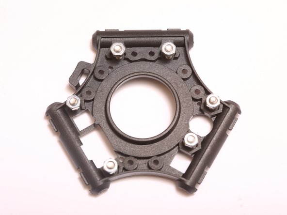 NOTE:  It may be easier to install these nuts and screw one at a time.