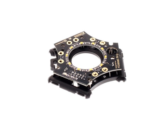 Note:  Some beta testers reported that it is easiest to lay the PCA down on the work surface with the connectors facing up and carefully press the plastic housing down over the connectors, working at clearing one connector at a time.