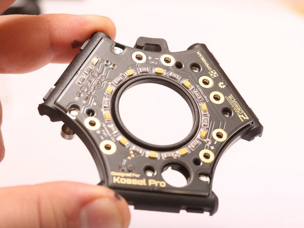 Press the end effector PCA all the way down against the plastic.