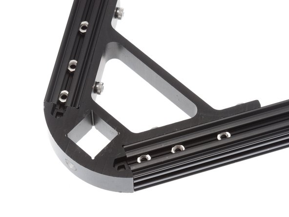 Using M3 x 6mm Button Head Cap Screws (BHCS), install vertex cap plates over the end of each vertex.