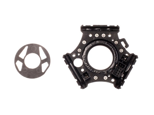 Apply glue to the inner ring of the end effector and the 3 stand off mounts as shown.