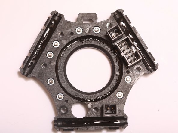 Apply glue to the inner ring of the end effector and the 3 stand off mounts as shown.