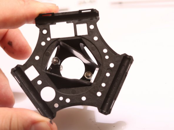 Thread 2x M3 x 18mm SHCS through the top of the end effector, and secure with M3 nuts, threading the screw 3-4 turns past the nut to ensure that it will not fall out accidentally.