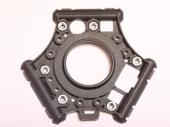 From the bag labeled: "End Effector Rebuild Kit", remove the 3 pieces of the end effector housing.