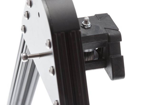 Slide an idler block into the vertex. There is only one way the assembly will fit. Make sure that the side with the Locknut is facing inward toward the vertex cap.