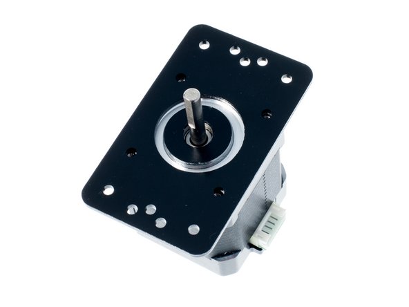Place an OpenBeam NEMA17 motor bracket onto a stepper as shown.