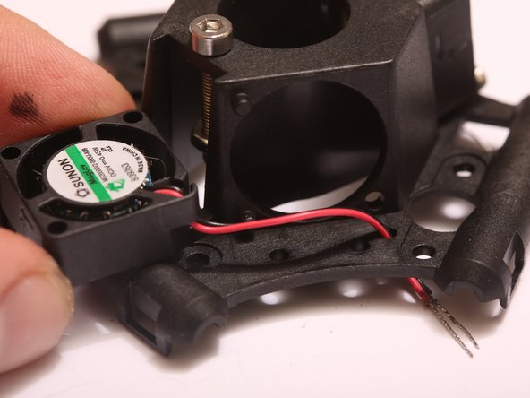 All fans should be installed with label side facing inwards.