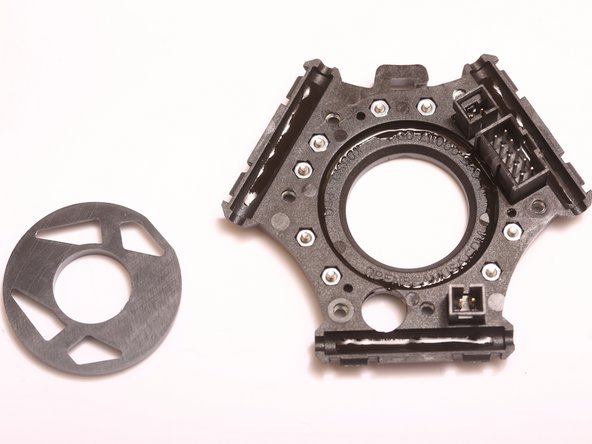 Place plastic inner duct into circular indentation and line up the flat edge of the duct against the flat edge of the connector.