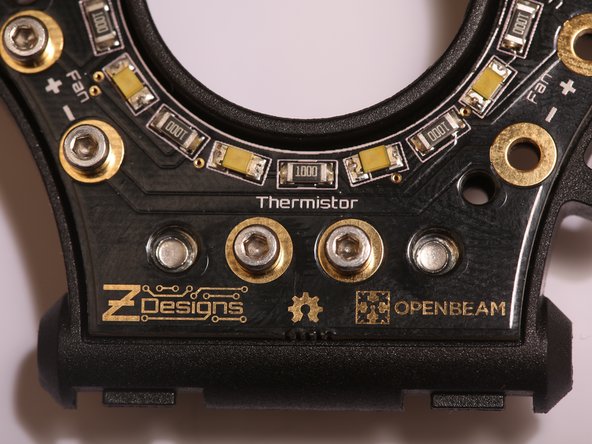 Install 8x M2 nuts as shown.