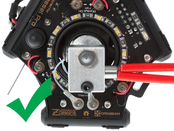 When installing the heater cartridge, verify that none of the heater cartridge protrudes beyond the heater block on the side where the auto probe is.