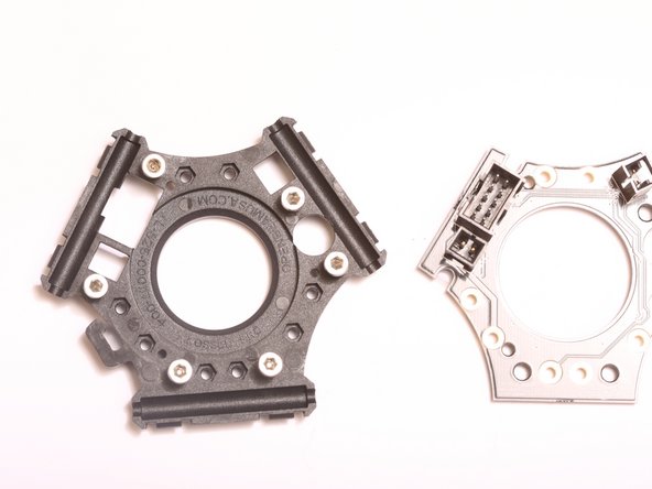 Using the round hole for the auto levelling probe, rotationally key the end effector PCA to the correct orientation.