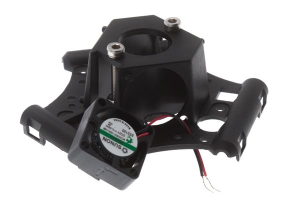 Look for the absent of a plastic peg holding the fan, that is the corner that the wires should go.