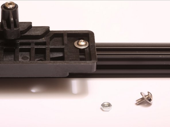 Set bed clamp aside with the M3 x 8mm button head cap screws and the M3 fender washers for mounting to the Lower Triangle later.